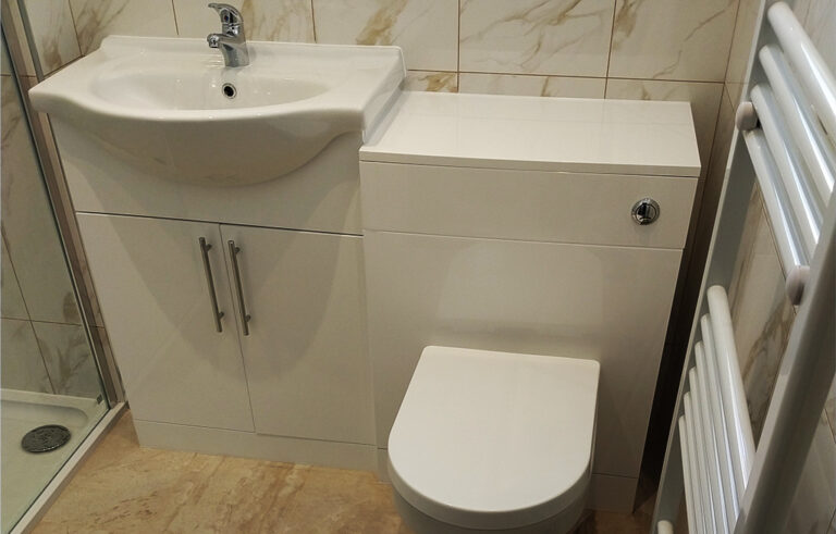 Refurbished bathroom sink and toilet